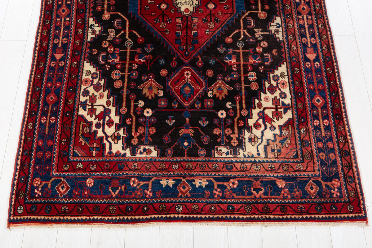 Vintage Black & Red Geometric Medallion Wool Rug – 8' 4" x 5' 2" (254 x 158 cm)