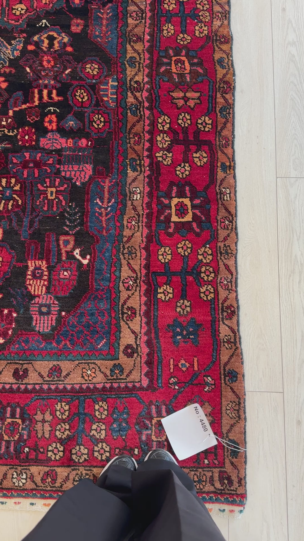 Close-up of corner details on Hand-Knotted Vintage Wool Area Rug – 9' 8" x 4' 9" highlighting floral border motifs and fine wool texture.