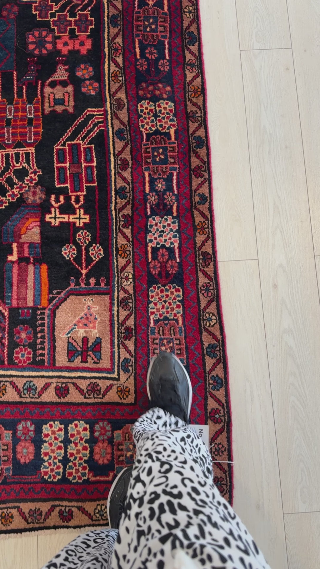 Close-up of border design on Hand-Knotted Vintage Wool Area Rug – 10' 5" x 5' 4" showing detailed motifs and rich color contrast.