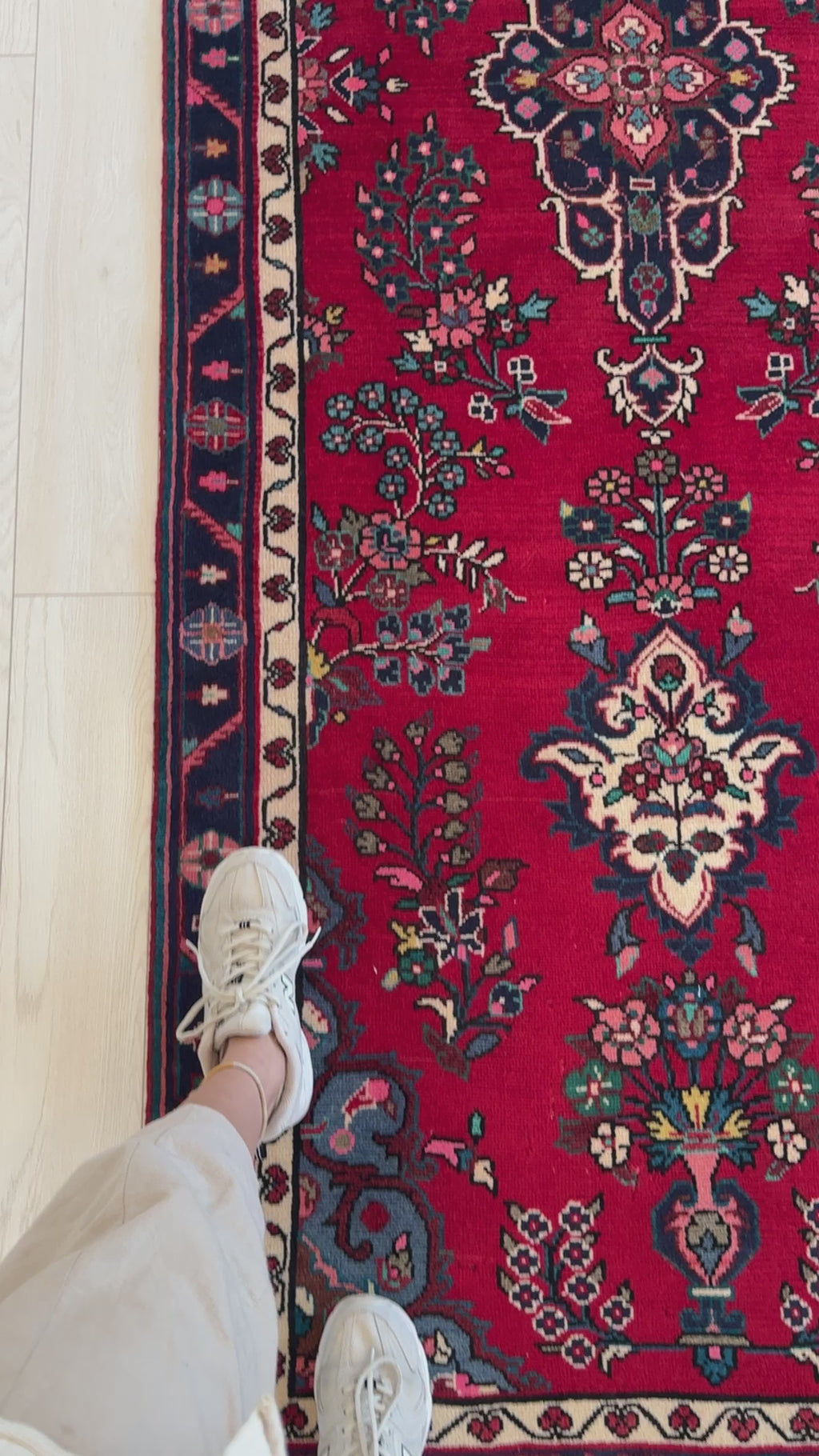 Close-up of Hand-Knotted Vintage Wool Runner Rug – 9' 9" x 3' 4" highlighting detailed floral patterns and rich red wool texture.