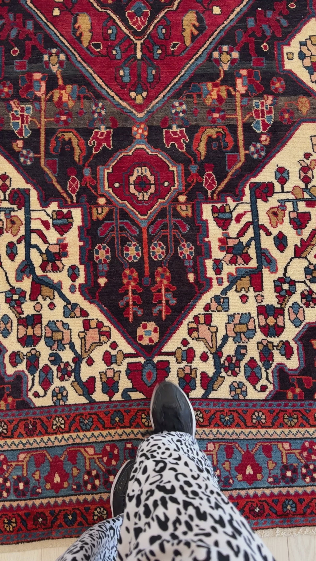 Close-up of Hand-Knotted Vintage Wool Area Rug – 9' 10" x 5' 4" highlighting the fine wool texture and vibrant traditional motifs underfoot.