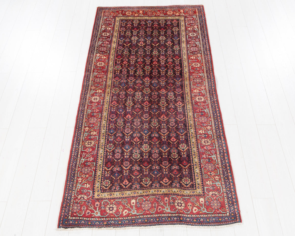 Rare semi-antique Mahal rug with muted navy blue allover pattern and rust red border, SKU 5134