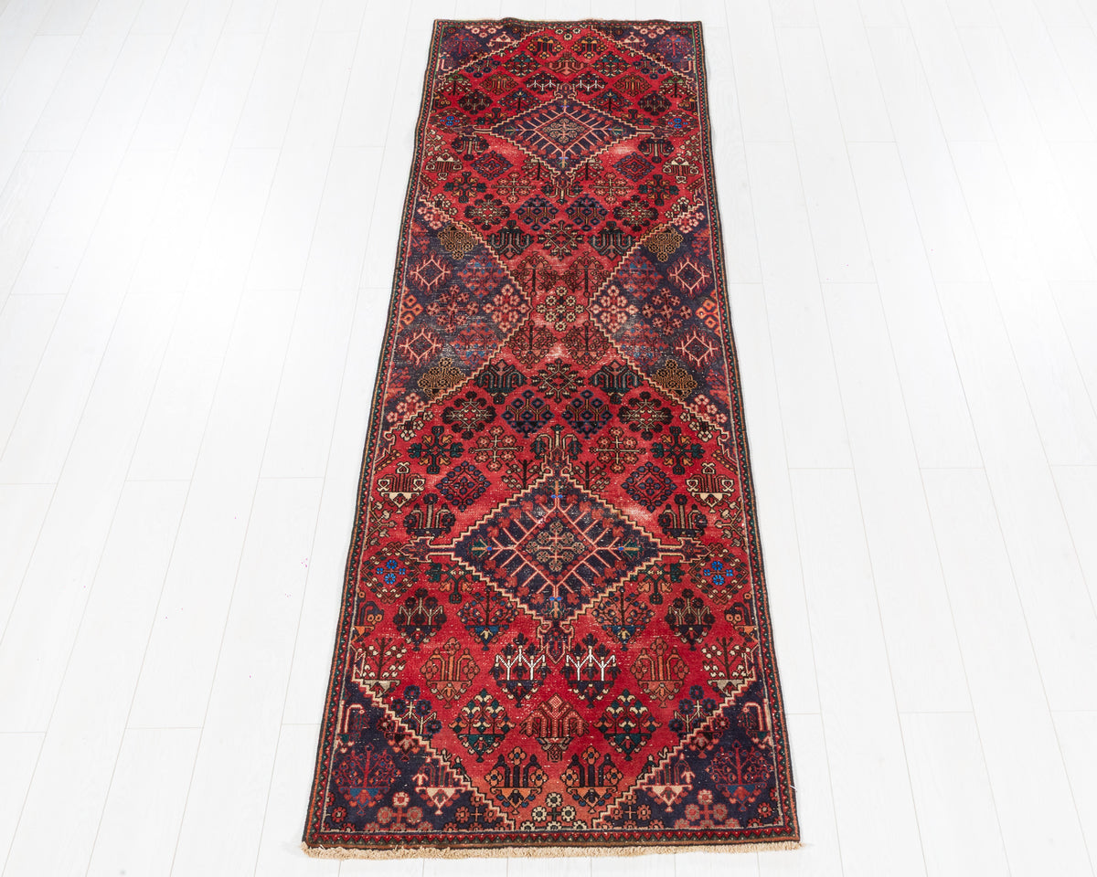 Vintage Joshaghan runner with red field and geometric tribal design, SKU 5167