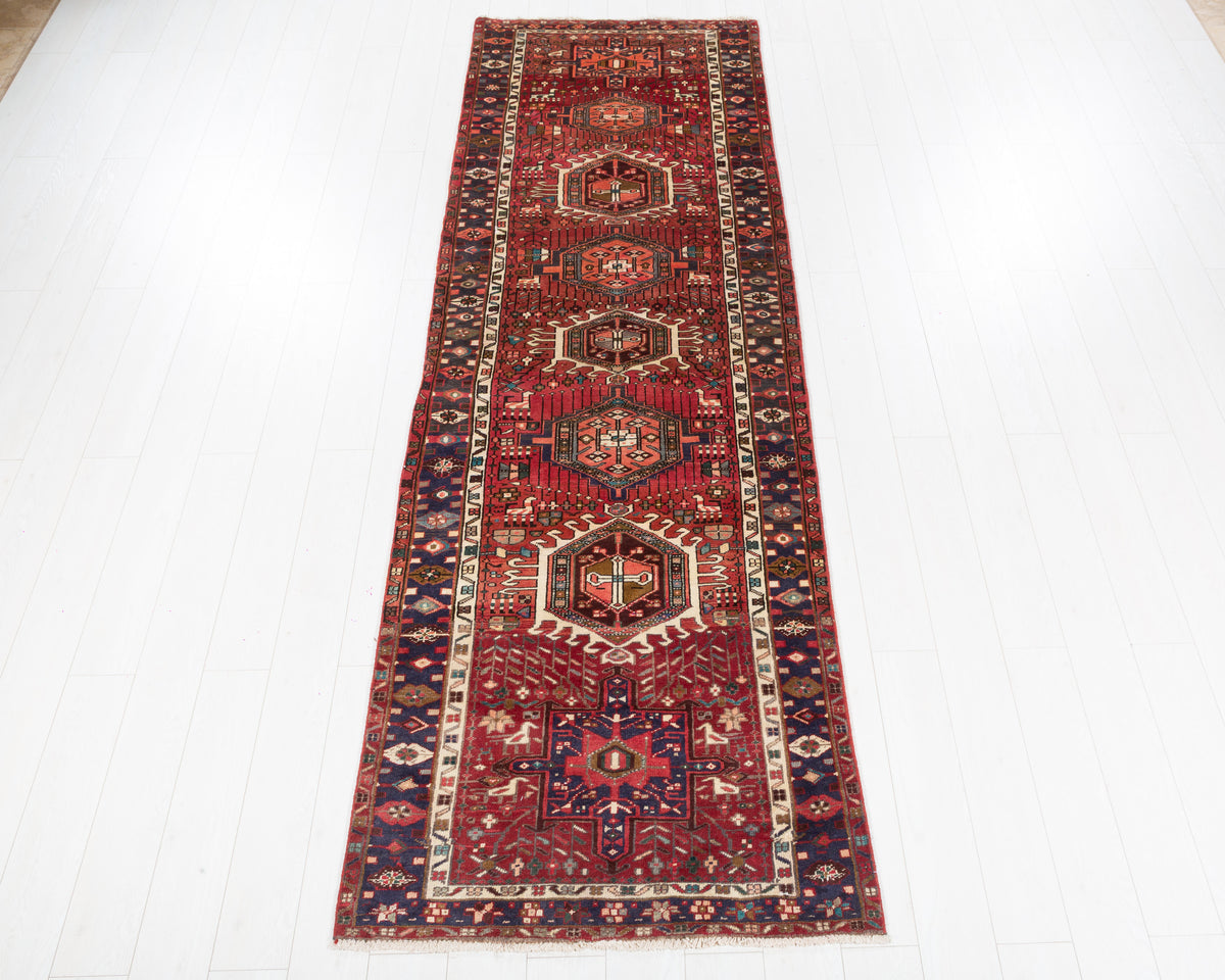Vintage Heriz Gharajeh runner with red field and geometric medallions, SKU 5171