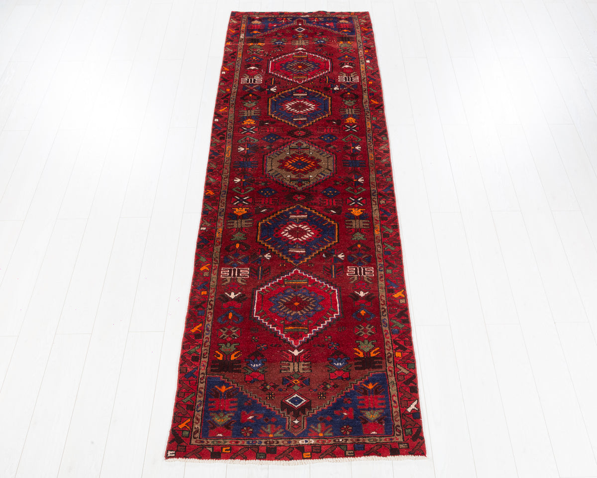 Vintage Hamadan repeating medallion wool runner rug, red and navy blue, SKU 5260