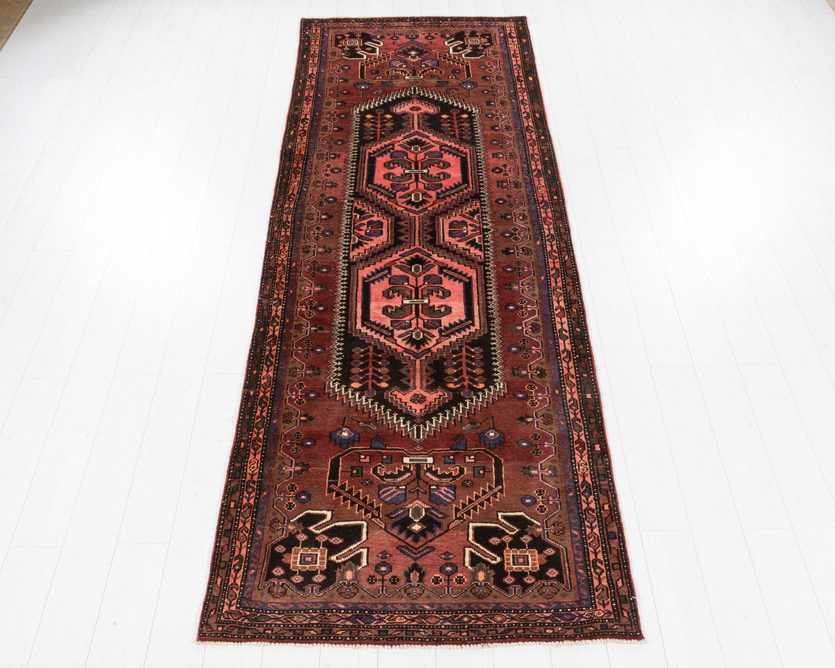 Vintage Zanjan geometric medallion wool runner rug, rust red and pink, SKU 5282