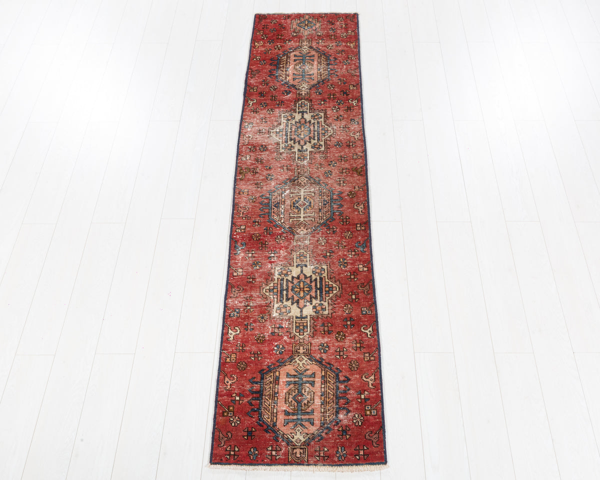 Vintage Heriz Gharajeh narrow faded red distressed runner rug SKU 5323