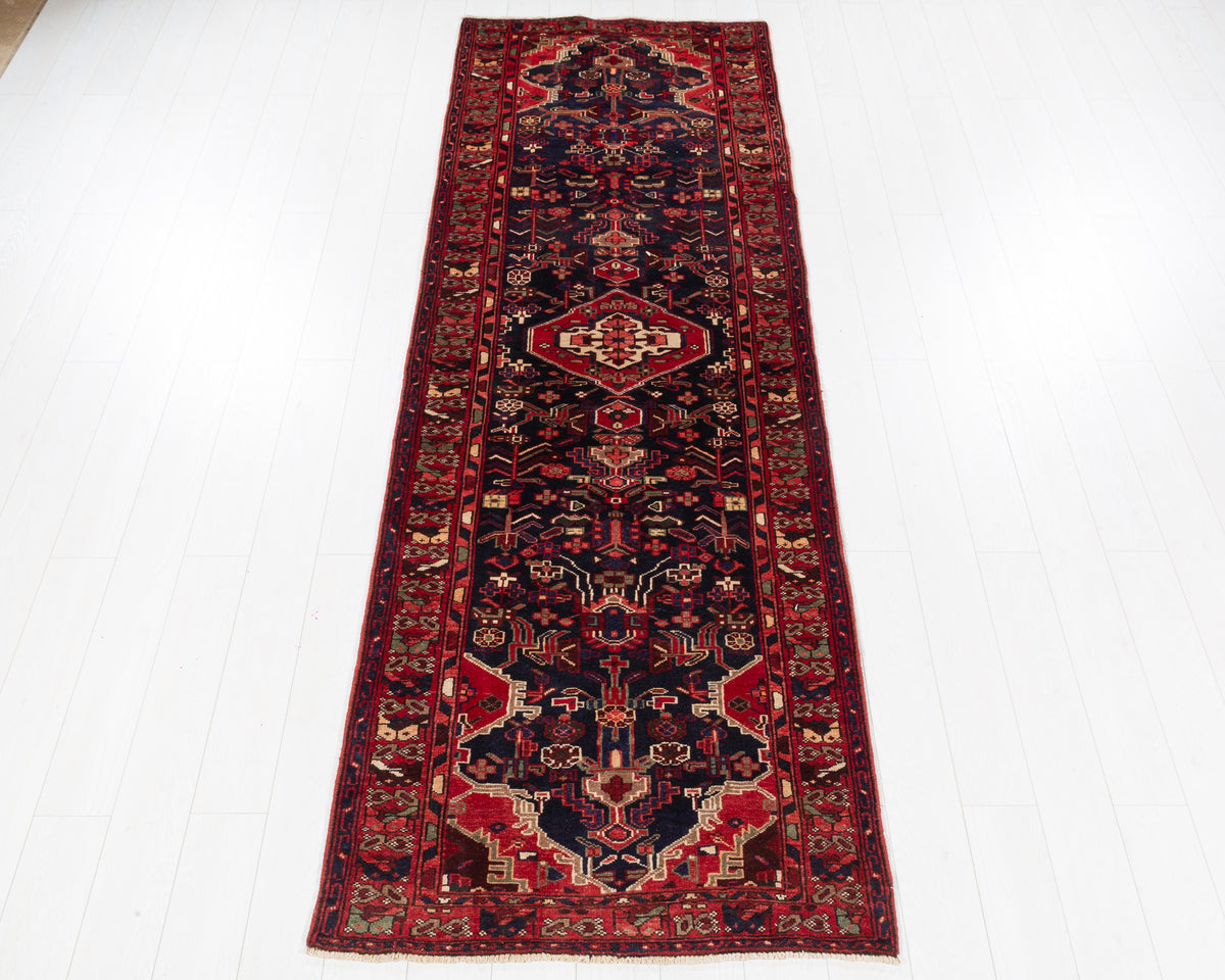 Vintage Hamadan floral medallion wool runner rug in deep navy blue and red, SKU 5223