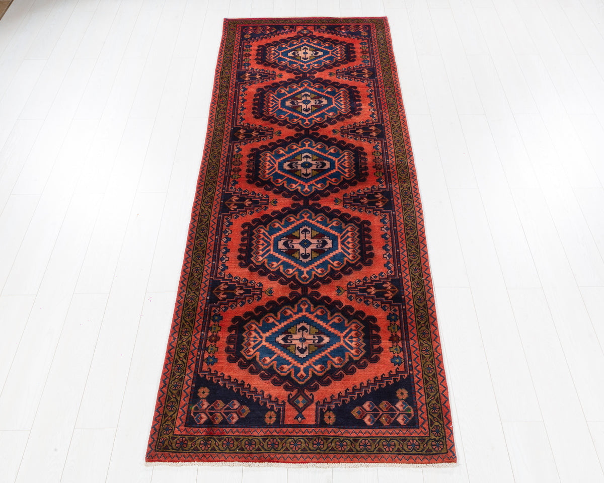 Vintage Viss geometric medallion wool runner rug in orange red and navy blue, SKU 5236