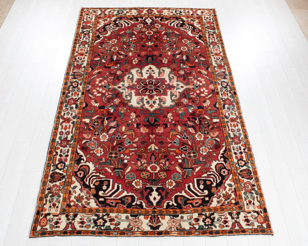 9' 2" x 5' 3" Excellent Hand-Knotted Vintage Soft Tribal Floral Rug - Yasi & Fara 